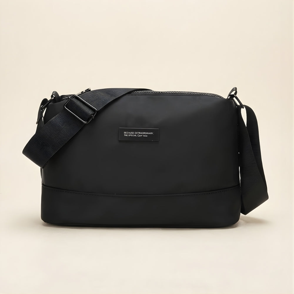 Léon – axelremsväska i tyg - skötväska med många fack | Carryelle