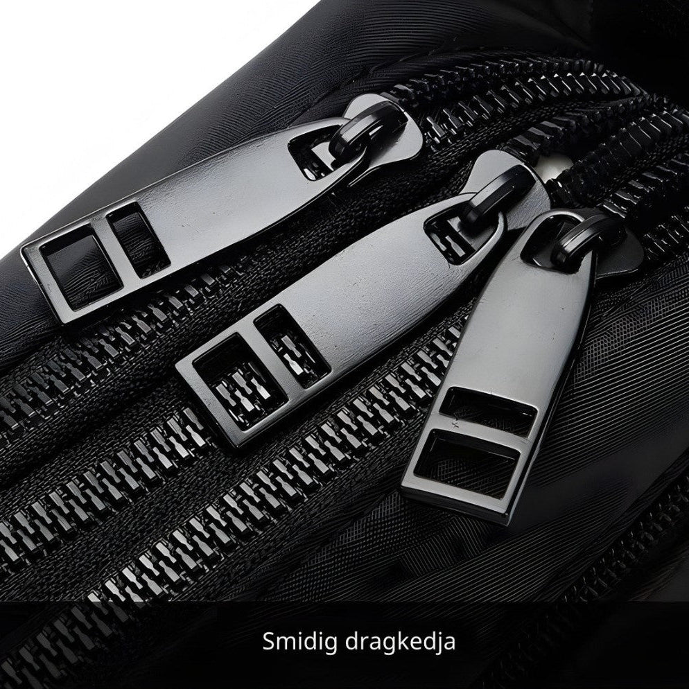 Léon – axelremsväska i tyg - skötväska med många fack | Carryelle